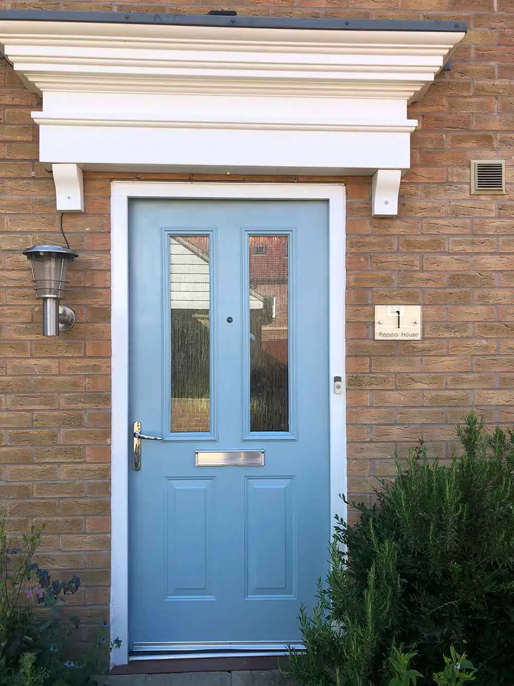 Freshly painted home exterior with clean, sharp trim