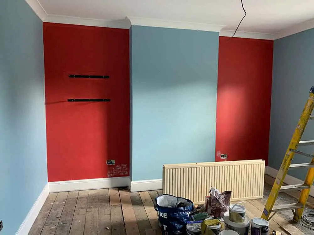 Detailed interior painting of walls and woodwork